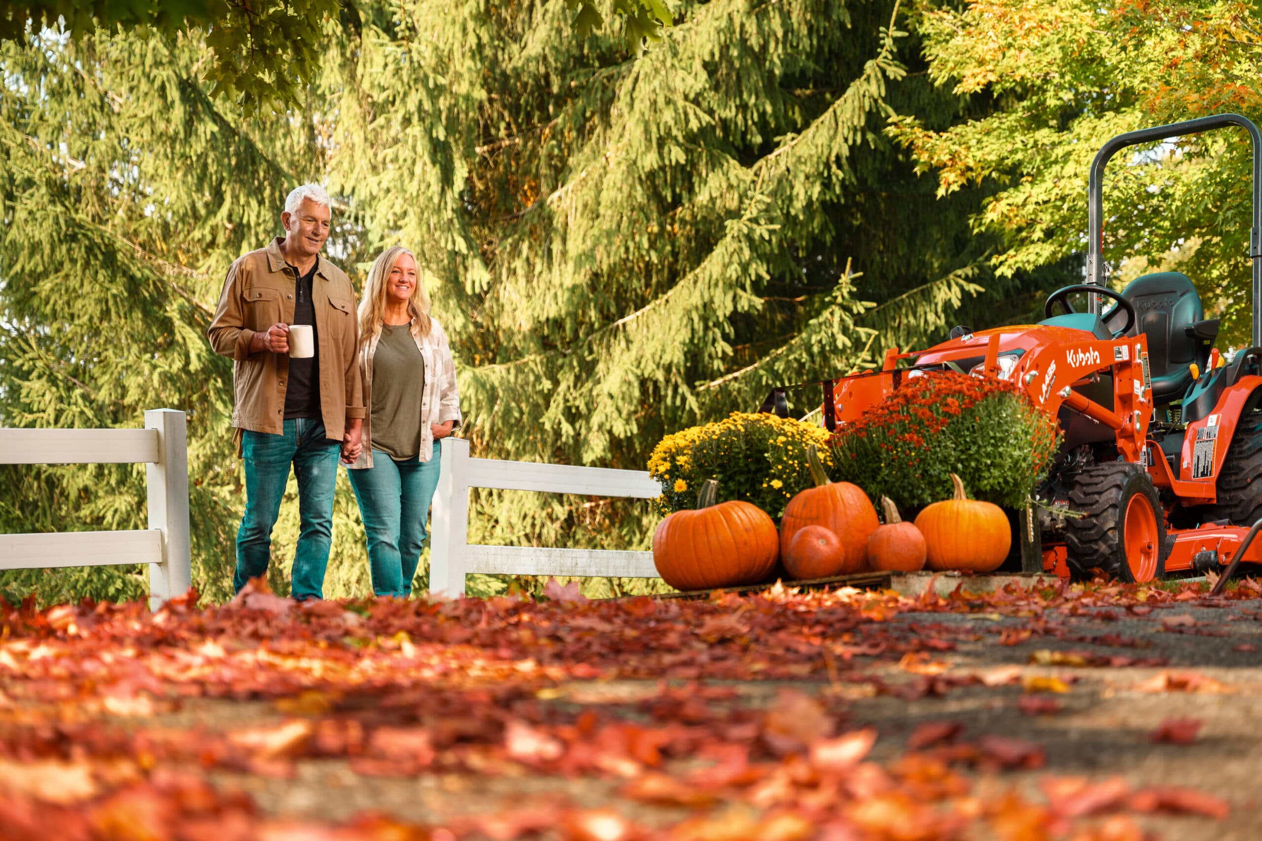 Fall customers with a Kubota tractor.